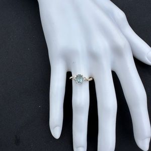 Beautiful 14k gold Blue Aquamarine ring with 2 diamond accents